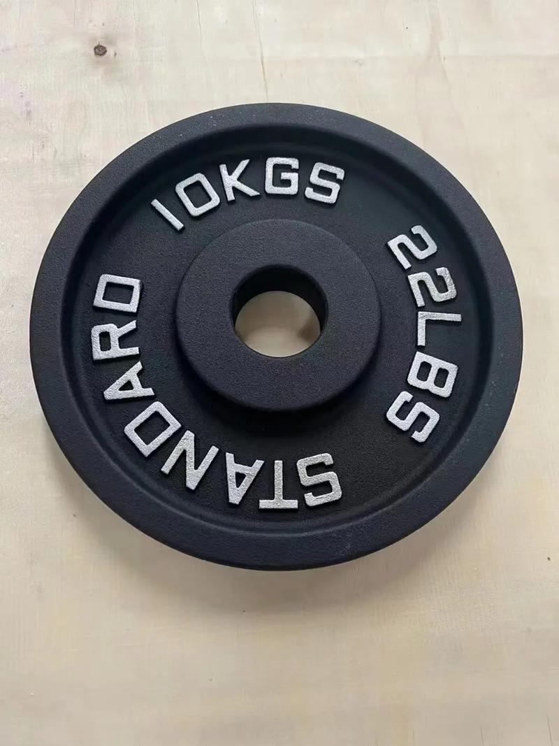 举重用的杠铃片的材质